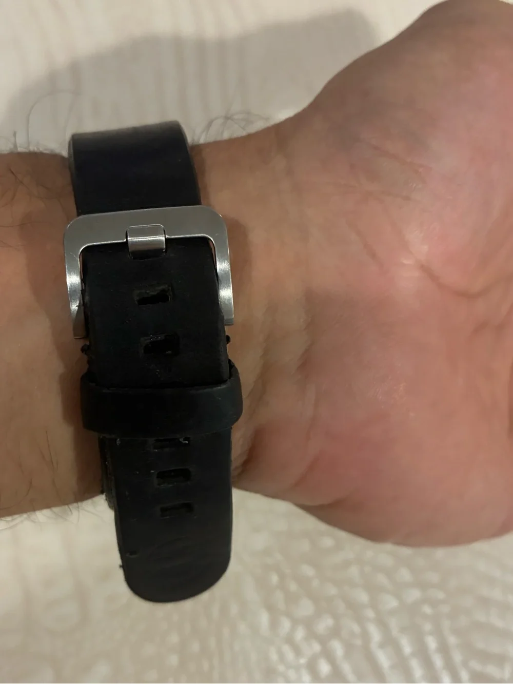 Samsung Silver Smartwatch with Black Strap and Blue Display